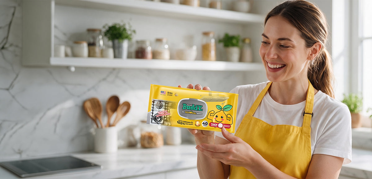 Drop the hero lifestyle shot — person using a BuddyX product in a bright kitchen